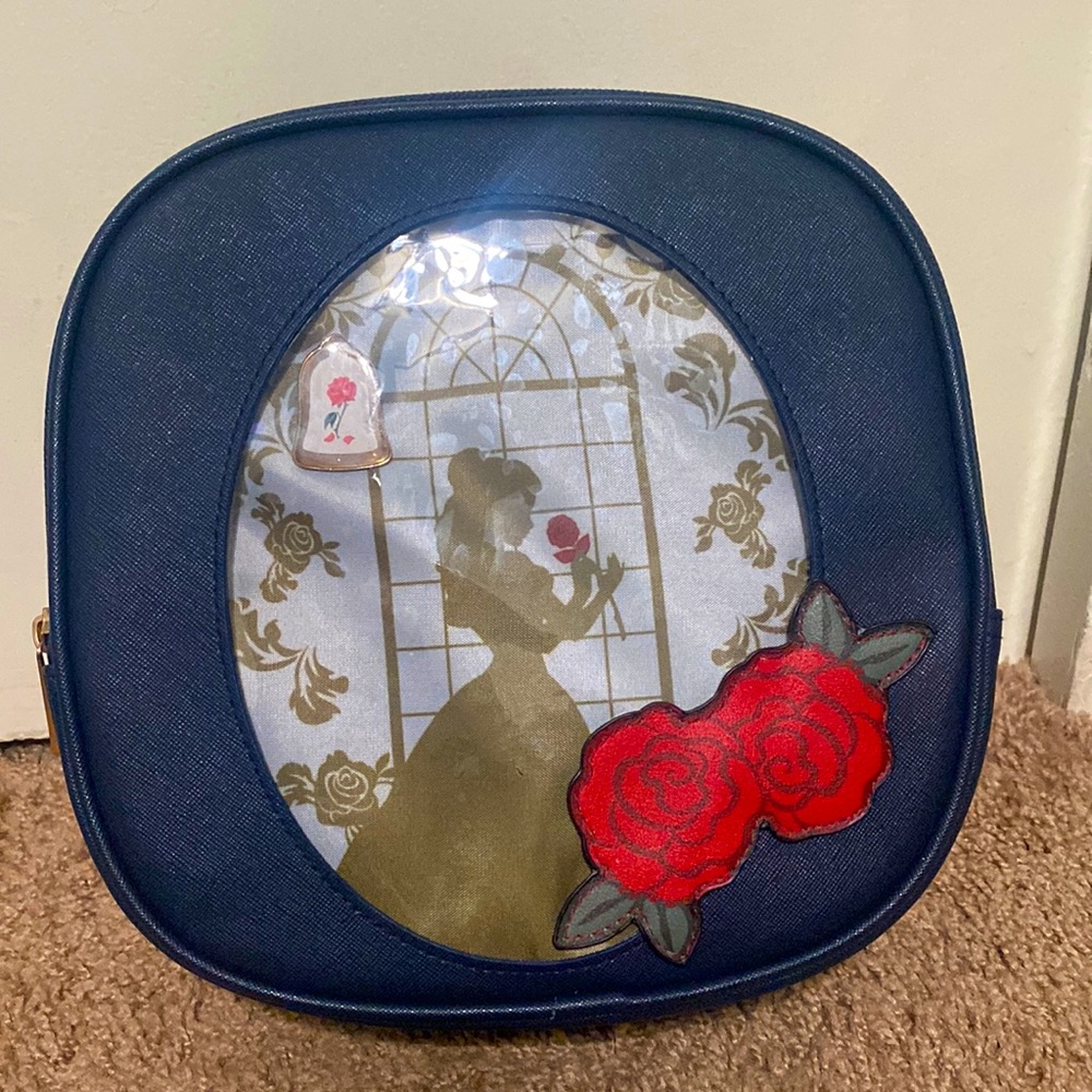 Belle pin collector backpack.